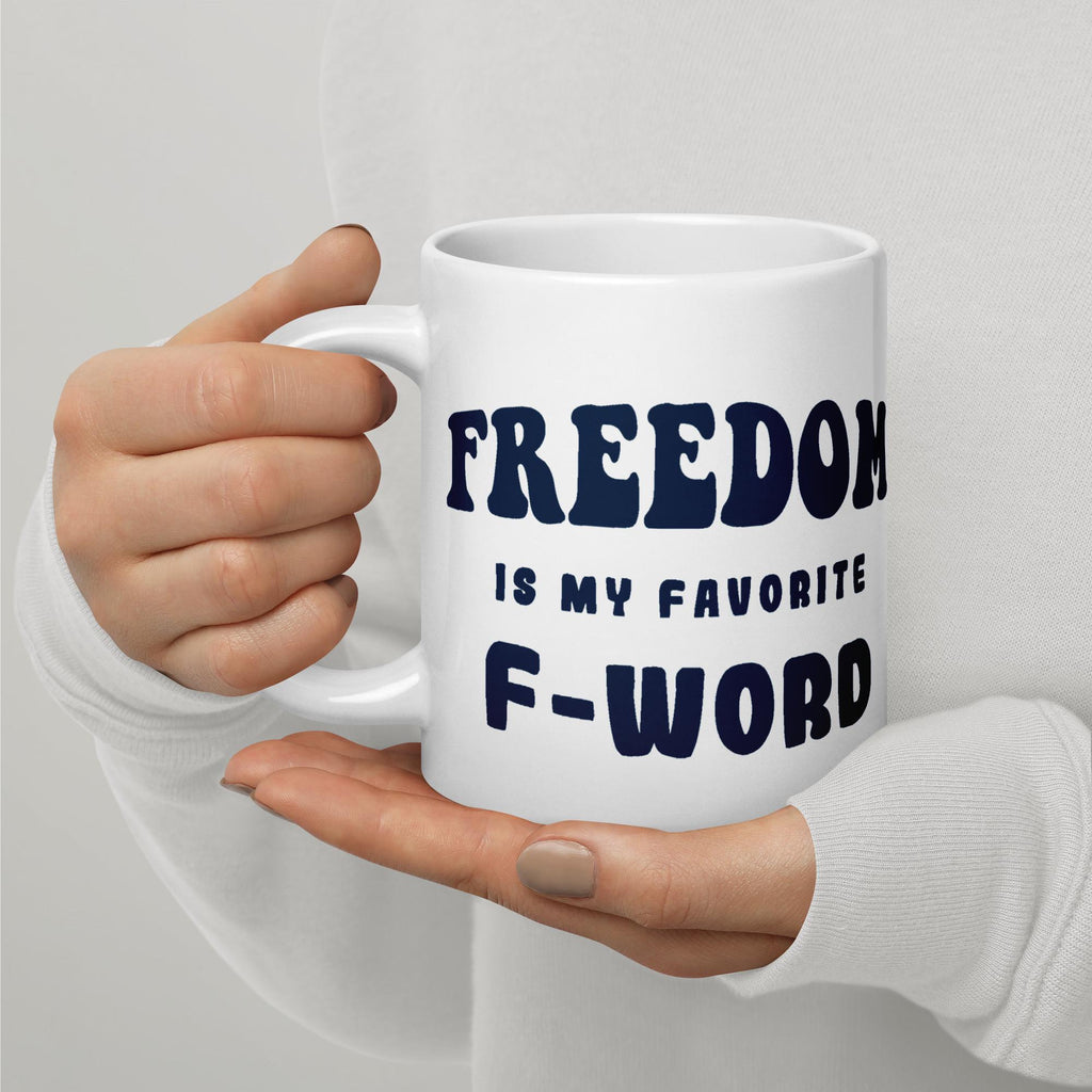 White glossy ceramic coffee mug printed with the phrase Freedom is My Favorite F-Word. Available in 11 oz, 15 oz, and 20 oz. Dishwasher and microwave safe, lead-free and BPA-free. A funny patriotic gift for liberty lovers and coffee drinkers.