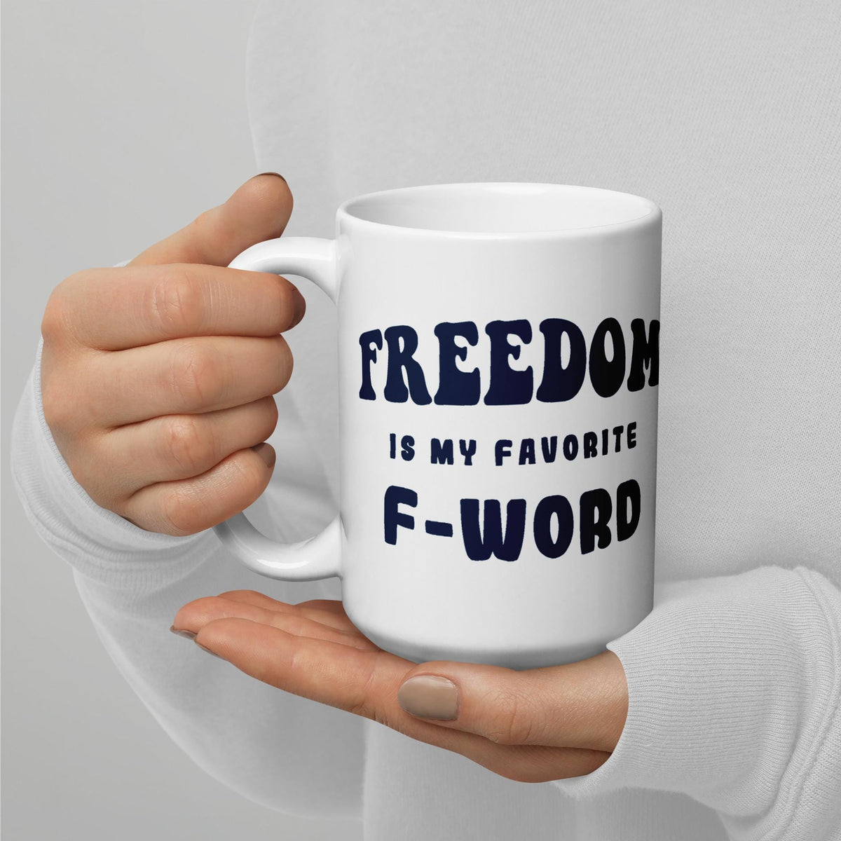 White glossy ceramic coffee mug printed with the phrase Freedom is My Favorite F-Word. Available in 11 oz, 15 oz, and 20 oz. Dishwasher and microwave safe, lead-free and BPA-free. A funny patriotic gift for liberty lovers and coffee drinkers.