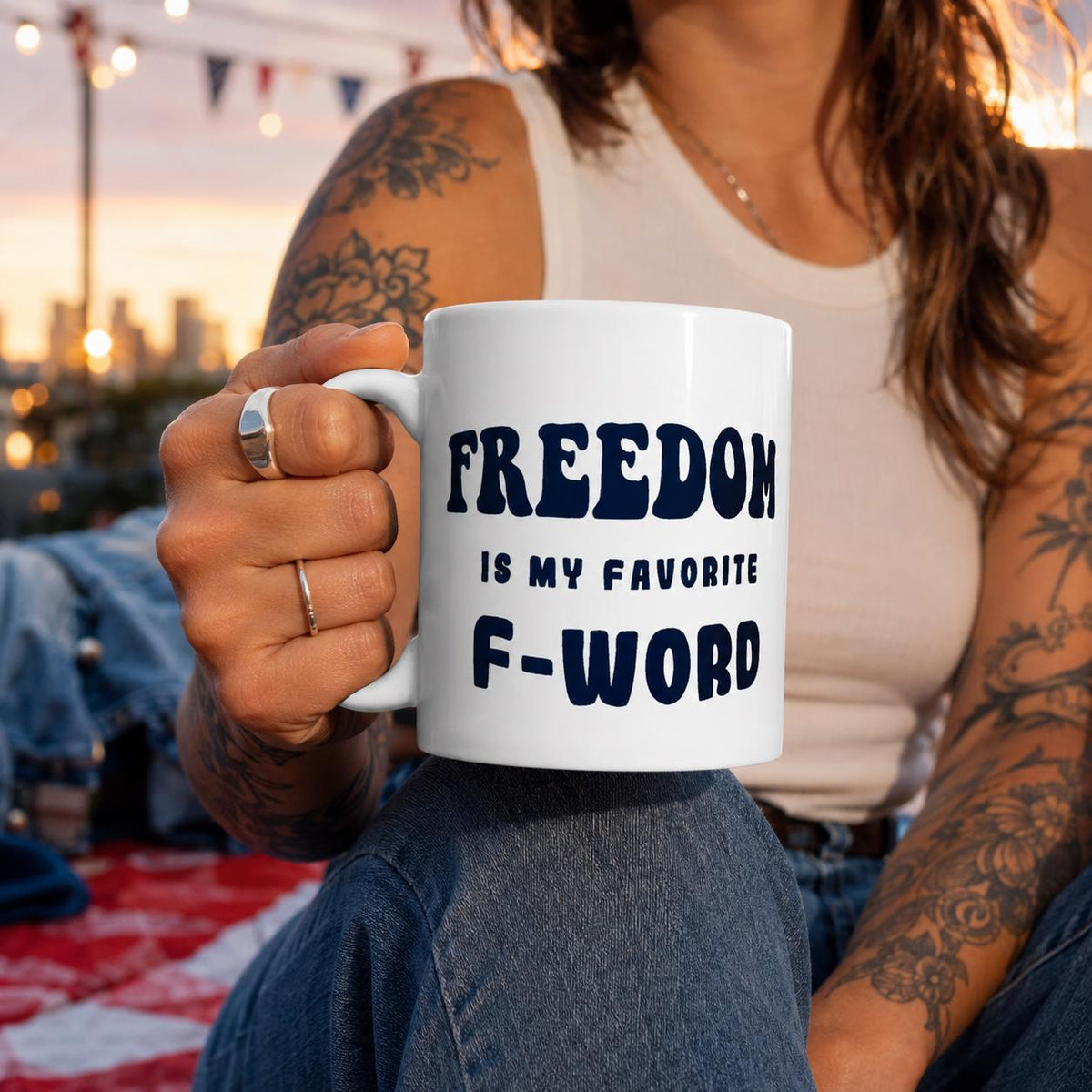 White glossy ceramic coffee mug printed with the phrase Freedom is My Favorite F-Word. Available in 11 oz, 15 oz, and 20 oz. Dishwasher and microwave safe, lead-free and BPA-free. A funny patriotic gift for liberty lovers and coffee drinkers.