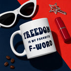 White glossy ceramic coffee mug printed with the phrase Freedom is My Favorite F-Word. Available in 11 oz, 15 oz, and 20 oz. Dishwasher and microwave safe, lead-free and BPA-free. A funny patriotic gift for liberty lovers and coffee drinkers.